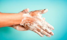 Closeup of person washing hands isolated. Cleanliness and body care concept.